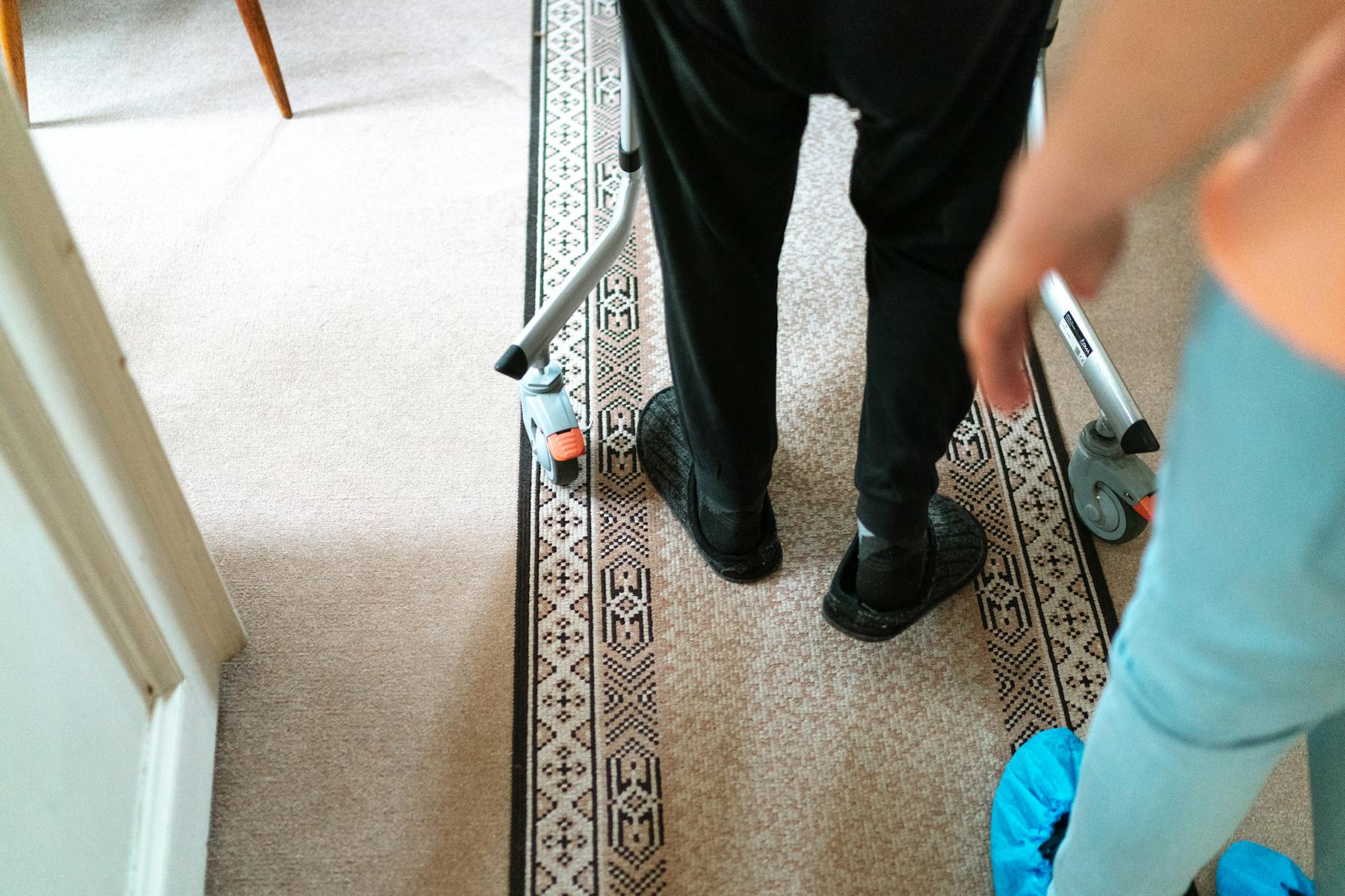 Older adult receiving in-home walker and mobility support